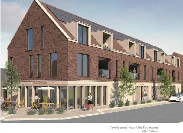 Ein modernes, dreistöckiges Backsteingebäude mit großen Fenstern, Sonnenkollektoren auf dem Dach, Balkonen und Cafés im Erdgeschoss mit Sitzgelegenheiten im Freien und Spaziergängern in der Nähe. Der Gehweg ist von Bäumen gesäumt.
